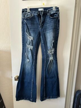 Distressed Dark Blue Flared Jeans - Wide Leg Style